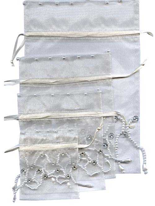 ORGANZA BAG - BEADED ORGANZA BAG - WHITE - SML. - 8 X 9CM - <p>Elegant hand beaded bags which can make lovely bags for wedding table gifts or for jewellery. Great packaging for other small gifts like scarves etc. Great for fancy party bags. Also available in three other sizes see BAG48, BAG49, BAG50 Sold in packs of 12</p> Quality natural handmade soaps, candle, home, bathroom & beauty products make great gift ideas for him & her for any occasion or if you just want to treat yourself.