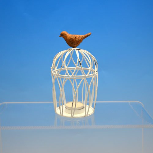 CANDLE HOLDER -  BIRDCAGE  HANGER - White metal birdcage topped with a clay coloured bird.   Fits 1 tealight candle or a small plant. 

8 x 13 x 18cm Quality natural handmade soaps, candle, home, bathroom & beauty products make great gift ideas for him & her for any occasion or if you just want to treat yourself.