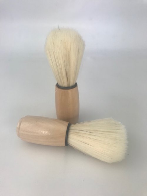 SHAVING BRUSH NATURAL WOOD - A NATURAL WOODEN BASE HANDLE WITH SYNTHETIC BRISTLES. FOR THOSE WHO WANT TO USE A SHAVING BRUSH THEN THIS BRUSH IS IDEAL. A SHAVING BRUSH SOFTENS & LIFTS THE FACIAL HAIR WHILST GENTLY EXFOLIATING THE SKIN OF ITS DEAD CELLS. THE PERFECT LATHER PRODUCES THE PERFECT SHAVE.   Quality natural handmade soaps, candle, home, bathroom & beauty products make great gift ideas for him & her for any occasion or if you just want to treat yourself.